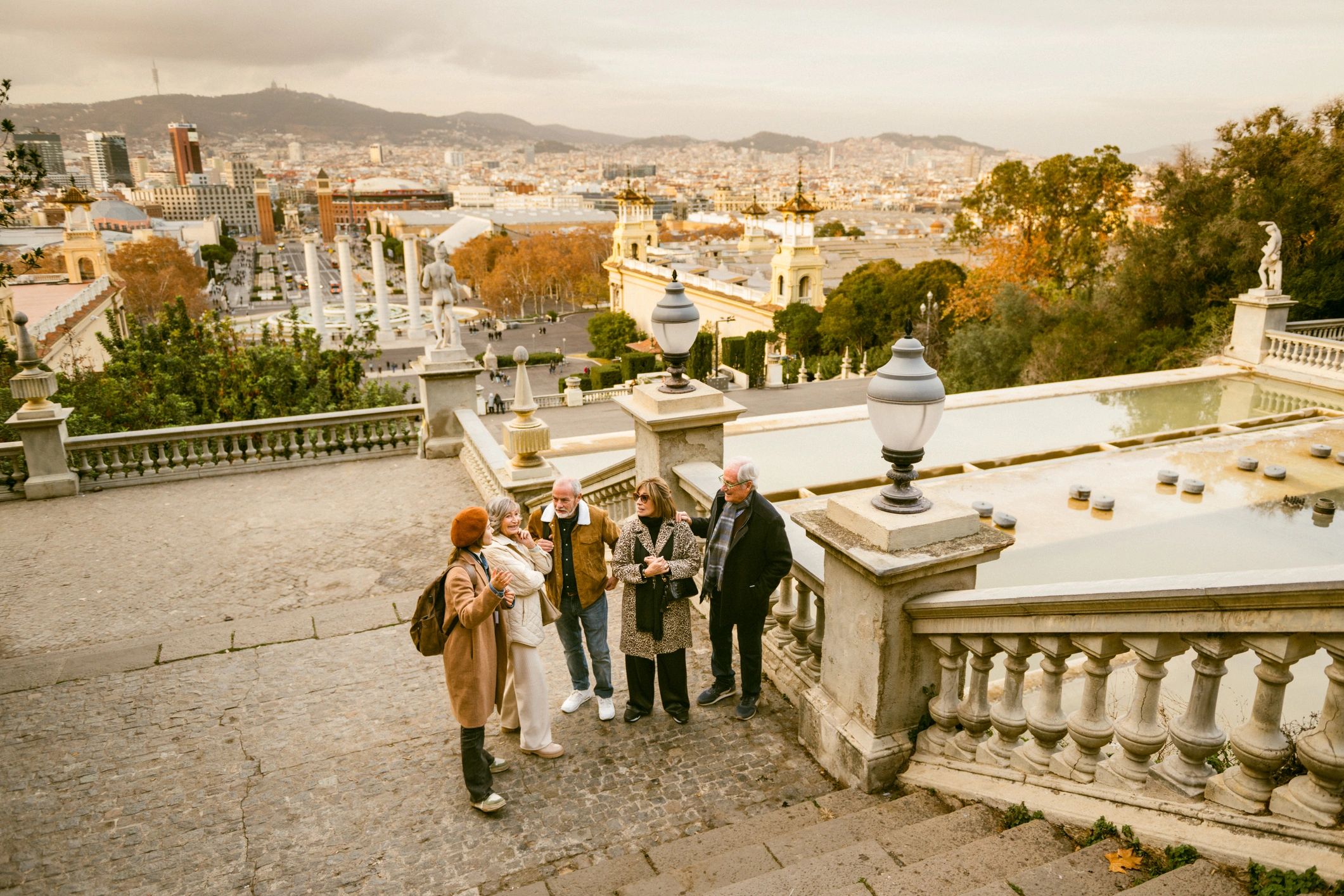 Tourist guide showing the city views to a group of seniors